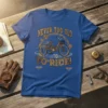 Never Too Old To Ride! quote with vintage tricycle graphic on a blue t-shirt