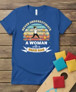 Never Underestimate A Woman with a Bean Bag T-Shirt features a woman throwing bean bags with colorful retro stripes in