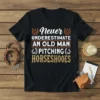Never Underestimate An Old Man Pitching Horseshoes t-shirt with vintage horseshoe graphics and bold typography