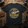 Never Underestimate An Old Man With A Chainsaw T-Shirt featuring a vintage chainsaw graphic and bold typography
