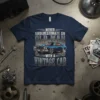Never Underestimate An Old Man With A Vintage Car T-Shirt featuring a blue classic muscle car and bold text