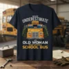 Never Underestimate An Old Woman Who Drives A School Bus t-shirt design featuring a vintage school bus graphic and bold