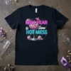 New Year Same Hot Mess graphic t-shirt with a cocktail glass, neon text, disco ball, and confetti