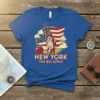 New York The Big Apple t-shirt design featuring the Statue of Liberty, American flag, and a red apple graphic