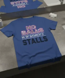 No Balls In Women's Stalls text design on a blue t-shirt with feminist symbols and bold typography