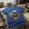 Blue t-shirt with "No Lo Se" text in ornate gold lettering, surrounded by abstract gold and blue splatters and flourishes