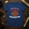 Nobody Expects The Spanish Inquisition text with a shield emblem on a blue t-shirt