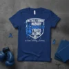 Blue t-shirt with text "In This Family Nobody Fights Alone" and #Human Trafficking Awareness, featuring boxing gloves and ribbon graphic