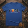 NOPE. BIDEN – HARRIS 2020 text with Trump's profile silhouette on a blue t-shirt