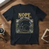 Nope. Not Today. text with a sleeping cat curled up in a decorative moon frame on a navy t-shirt
