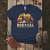 Nor Cal text with a bear and mountains graphic on a navy t-shirt, vintage retro sunset style