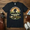 Bigfoot golfer t-shirt with text "Not All Who Wander Are Lost Some Are Looking For The Golf Ball" and a