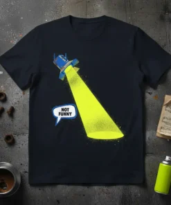 Dark t-shirt with a blue spotlight graphic shining a bright yellow beam, featuring a speech bubble with "NOT FUNNY" text