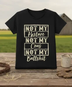 Black t-shirt with white text reading "NOT MY Pasture NOT MY Cous NOT MY Bullshit" in a vintage distressed font