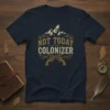 Not Today Colonizer text with crossed revolvers and mountain graphic on a navy t-shirt