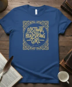 Blue t-shirt featuring the quote "Obstinate, Headstrong Girl Jane Austen" in decorative gold lettering