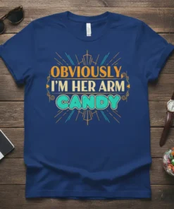Obviously, I'm Her Arm Candy quote on a navy blue t-shirt with retro-style orange and teal typography