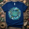 Ocean Protector t-shirt design featuring a circular wreath of waves, coral, jellyfish, sea turtles, a dolphin, and a shark