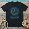 Ocean Spirit Guardian of the Depths t-shirt with a blue and yellow dolphin and wave graphic within a sun-like mandala