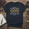 Dark navy t-shirt with gold lettering quote "Of Course. I Talk To God Who Else Can I Trust."
