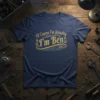 Navy t-shirt with "Of Course I'm Amazing I'm Ben" text in gold and teal vintage-inspired font