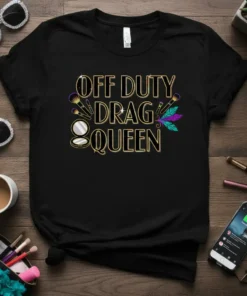 Off Duty Drag Queen text with makeup brushes and feathers graphic on black t-shirt