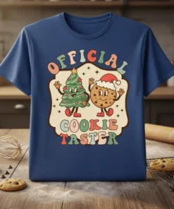 Official Cookie Taster text with cartoon Christmas tree and Santa cookie characters on a retro-style graphic tee