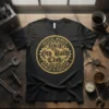 Black t-shirt with gold distressed circular design: "Official Member Est. 1975 The Old Ball's Club Wrinkled to Perfection"