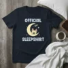 Official Sleepshirt text with a cute French Bulldog sleeping on a crescent moon graphic, stars, and Zzz