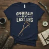 Officially On My Last Leg t-shirt with a vintage-style crutch graphic and distressed typography