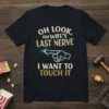 Black t-shirt with "OH LOOK, my WIFE'S LAST NERVE I WANT TO TOUCH IT" text and a pointing finger graphic