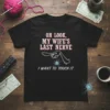 Black t-shirt with white and red text: "OH LOOK, MY WIFE'S LAST NERVE I WANT TO TOUCH IT" and a