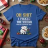 T-shirt with "OH SHIT I PICKED THE WRONG WHITE ELEPHANT GIFT" text and a cartoon elephant holding a gift