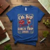 Oh Sip It's A Girl's Trip 2025 text with lips and wine glass graphic on a blue t-shirt