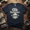 Ok Boomer. text with a grumpy older man's face graphic on a navy t-shirt