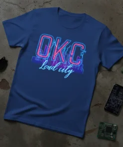 OKC Loud city text with neon glow and city skyline graphic on a blue t-shirt