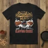 Black t-shirt with "OLD ROW Smokin' MEATS and CLAPPING CHEEKS" text, featuring ribs, a grill, and steak graphic