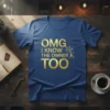 Gold text "OMG I KNOW THE OWNER K TOO" with a crown graphic on a navy blue t-shirt