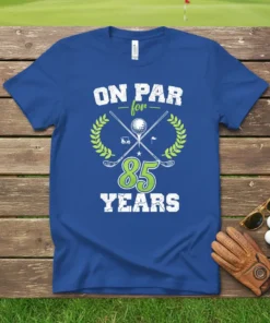 Blue t-shirt with "ON PAR for 85 YEARS" text, golf clubs, ball, and laurel wreath graphic for an 85th birthday