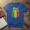One Love Rasta Pride T-Shirt with three stylized faces and reggae flag colors