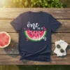 Navy t-shirt with "one in a melon" text and a watermelon slice graphic