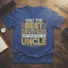 Only The Best Brothers Get Promoted To Uncle text on a blue t-shirt, vintage distressed style with gold and red
