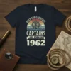 Vintage t-shirt design with text "Only the Greatest Captains Are Born in 1962" and a nautical anchor graphic