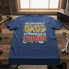 Only The Greatest Dads Get Promoted To Grumpa text design with gears and distressed lettering on a navy t-shirt
