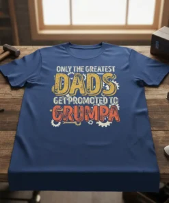 Only The Greatest Dads Get Promoted To Grumpa text design with gears and distressed lettering on a navy t-shirt