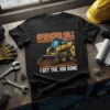 Operator No.1 I Get The Job Done skid steer t-shirt design featuring a yellow skid steer loader digging dirt
