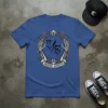 Blue t-shirt with "Original Gangster" text and skeletal hands framing a circular emblem with stylized letters