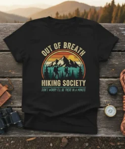 Black t-shirt with "Out of Breath Hiking Society Don't Worry I'll Be There In A Minute" text and vintage mountain