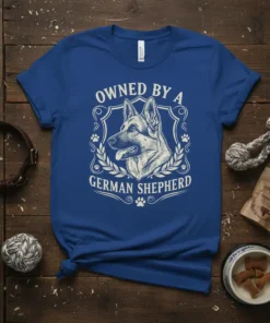 Owned By A German Shepherd text with a detailed drawing of a German Shepherd's head within a shield, surrounded by