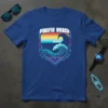 Pacific Beach California California text with a large wave graphic and colorful retro sunset stripes on a blue t-shirt